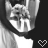 A grayscale animated icon shows a person's face with changing mouth shapes and heart symbols, set against a black background.
