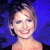 A pixelated image of a smiling woman with short brown hair against a blue background, next to green text reading 'Original Icons .com' on dark green.