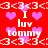 Red background with repeating white text and pink hearts, featuring 'I luv tommy' phrases in pixelated font.