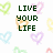Pixelated image with dark green text "LIVE YOUR LIFE" centered on white background, surrounded by pastel-colored heart shapes in light green, pink, blue, purple, yellow, and red.