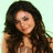A woman with long dark hair appears in three distinct poses against a light green background, each showing different expressions and head positions.