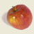 Pixelated red apple with yellow highlights and brown stem next to bold black text reading "I AM A FRUIT" on a light beige background.