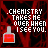 .CHEMISTRY TAKES ME OVER WHEN I SEE YOU. text appears above a red liquid bottle with changing contents on a dark red patterned background.