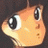 Pixelated anime-style character face with large eyes and peach-colored skin, next to black background with white text.