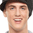 A static image of a person wearing a dark beanie and gray shirt, with text elements including "DANCE SING DREAM" in pink on black background.