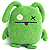 Green pixelated character with one eye open, one X-shaped eye closed, black horizontal mouth line, red tongue sticking out, and rounded ears.