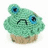 Pixelated green cupcake with blue eyes and a downturned mouth on white background, accompanied by green text reading "It's a sad cupcake...".