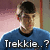 A person in a blue shirt with black collar appears across four , each showing different text overlays and expressions