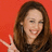 A pixelated image of a person with long brown hair making a peace sign against a solid red background, with overlaid text reading "I Love Hannah Montana".