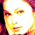 Pixelated close-up of a stylized face with warm color palette and abstract background elements.