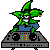 Pixel art character with green star-shaped head and blue outfit sits on gray DJ turntable with black knobs and colored buttons.