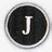 Circular icon with dark center and light gray border containing a white serif capital letter J on black background.