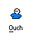Pixelated character in blue shirt with white face and black eyes, holding brown oval object, text "Ouch" below, gray background.