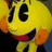Pixelated yellow character with black eyes and red mouth, orange cheeks on left; four- with text blocks