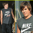 Two people in gray Nike shirts stand against a dark background with pink pixelated text reading "I don't think its obessive" and "cuz I stalk him! Is it?"