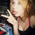 A pixelated image of a person with light brown hair making a peace sign, paired with two text boxes displaying 'iloveyou' and 'iloveyou a lot!!'