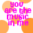 Pixelated text reads "you are the music in me" in bright pink over orange circular shapes on white background.