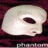Two side-by-side animated frames of a white cartoon skull icon with dark eye sockets and nose cavity on a maroon background, showing subtle facial expression changes between frames.