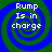 Four identical spiral patterns with blue and green concentric rings, each containing white text reading "Rump Is in charge" in a pixelated font.