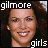 Two side-by-side pixelated images of a woman with dark curly hair, one smiling broadly with visible teeth, the other with a subtle smile, both with 'gilmore' text above and 'girls' below.