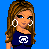 Pixelated image of a woman with long brown hair wearing large hoop earrings and a dark blue top, standing against a bright blue background.