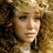 A 48x48 pixel buddy icon featuring a split composition with a woman's face on the left and text elements on the right against a black background.
