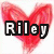 Red heart-shaped background with black text reading 'Riley' on left and 'you're really freakin sexy' on right.