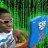 Pixelated image of a person in front of green foliage with a blue rectangular object on the right side.