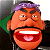 Pixelated cartoon character with orange skin, purple hair, green ear, and wide open mouth showing white teeth and red interior.