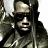 Static image of a person in military attire holding a rifle, with green text reading "Original Icons .com" on the right side.