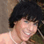 A static image with four quadrants: top-left shows a person with short dark hair and a pearl necklace, top-right has text "OH wow ur fine <33", bottom-left displays pink-and-white checkered background with text "I love you like a brother", bottom-right is solid gray.