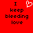 Red background with black text reading "I keep bleeding love" and a white pixelated heart symbol above the text.