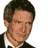 Static 48x48 pixel icon of a man's face with dark hair and formal attire against white background
