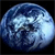 Pixelated blue sphere with gradient shading and light reflection on right side against black background.