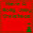 Red background with green text reading 'Have A Holly Jolly Christmas' and a small green tree icon, displayed in four identical quadrants.