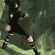 Animated sequence of a character in black outfit with white accents performing a fiery attack against a forest background.