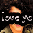 Pixelated image with two orange triangular shapes on dark background, white text reading 'love yo' in lowercase letters.