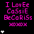 A static digital image displays pink text and white stars on a black background with a gray rectangle in the bottom-right corner.