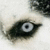 A close-up of a stylized eye with black eyeliner and white skin, showing subtle animation changes