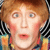 A 2x2 contact sheet of a pixelated animated icon featuring a character with red hair and a colorful patterned shirt, displaying text in blue block letters across four quadrants.