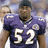 Pixelated image of a football player in a purple jersey with number 52, standing next to text reading 'Lewis is BEAST! #52' in purple block letters on black background.