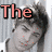 Six distinct headshots of a young man arranged in two , overlaid with large pink text reading "The ManyPhases Of Zac Efron"