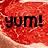 Red pixelated background with black text reading 'yum!' in lowercase letters, featuring a red exclamation mark.