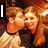 A pixelated image of two people in a close embrace, with text overlays changing across frames.