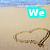 A four- shows beach scenes with text overlays: 'We' in cyan, a heart drawn in sand, an 'R' in red, and 'Unique' in pink