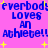 Pixelated blue text on pink background with yellow stars, repeating 'everybody loves an athlete!!' in two mirrored