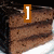 A four- of pixelated food images: chocolate cake slice, chocolate bar, chocolate chip cookies, and a blank