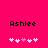 A bright pink background displays the name 'Ashlee' in black pixelated text above five white and light pink heart symbols, with one central heart changing color between frames.