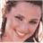 Two side-by-side pixelated images of a smiling woman with brown hair, one showing her face turned left and the other right, below which is text reading 'Jennifer Garner' in black script.