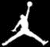 White pixelated silhouette of a basketball player mid-jump against black background, arms extended upward with one leg forward and the other trailing behind.